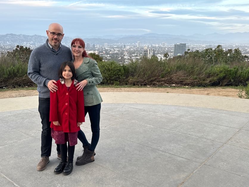Sean, Emily, and Fiona smiling after the proposal